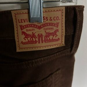 Women’s Levi's deep Brown Corduroy jeans. High waist. Size 32 w/stretch.